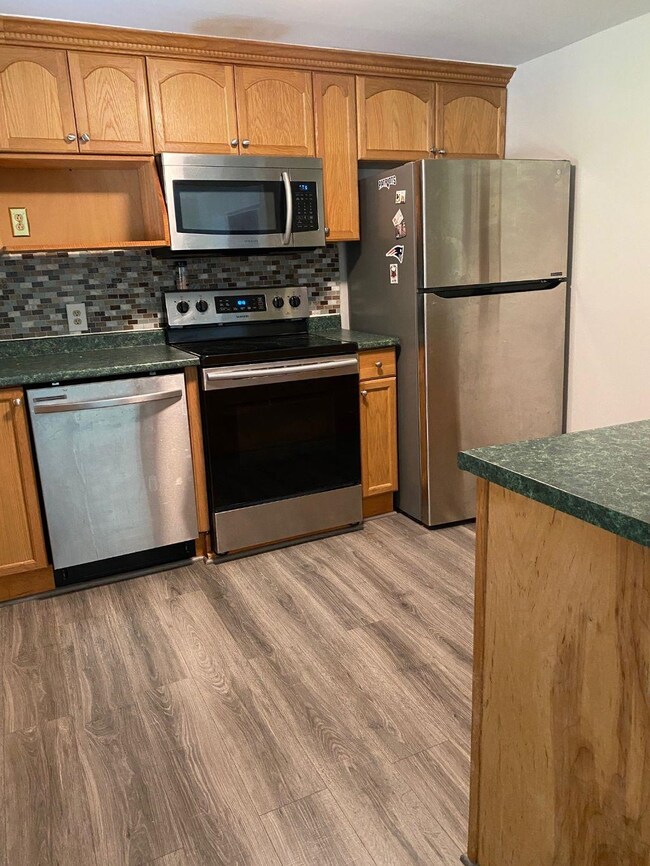 Stainless appliances and new flooring.