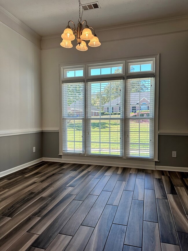 Formal Dining Room with large windows