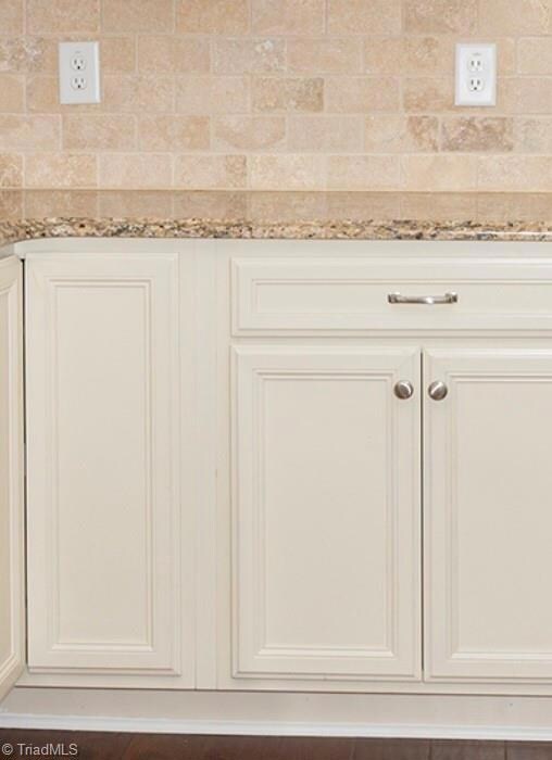 Cabinet Style and Color (Linen) - The Backsplash is Tumble Stone
