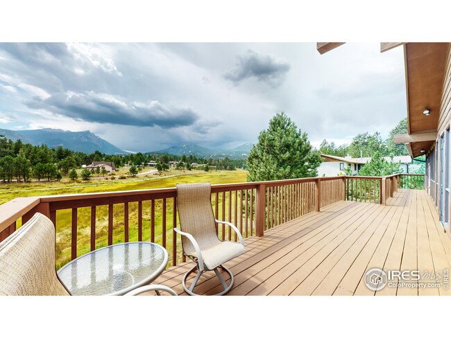 Lovely deck overlooking the meadow and ponds.