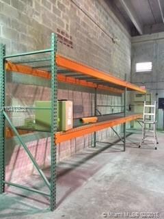 WAREHOUSE WITH HEAVY DUTY STANDS