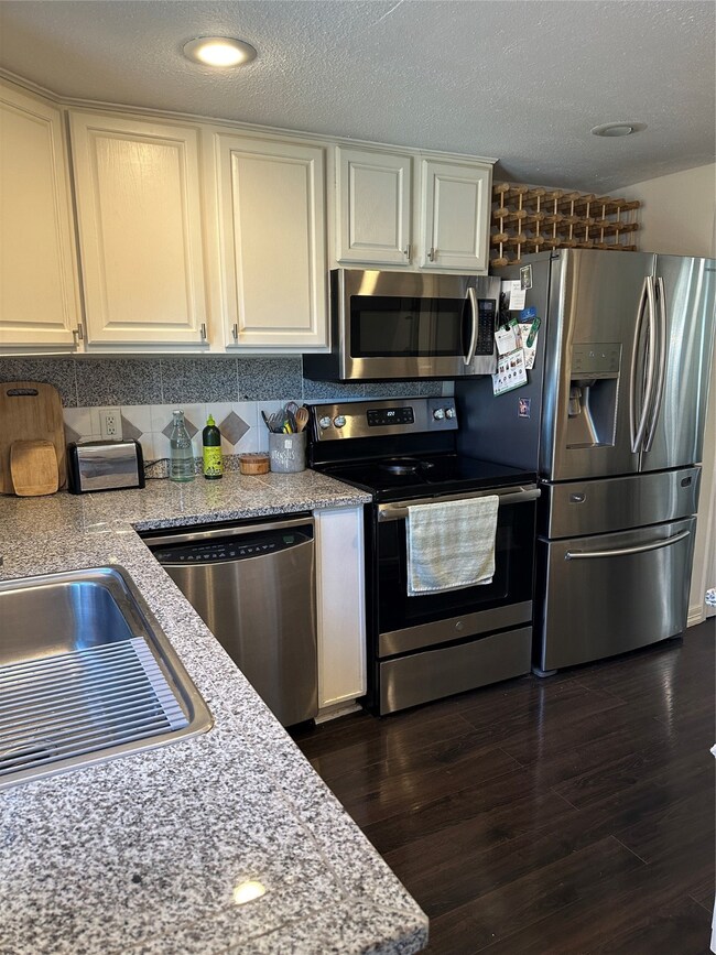 Kitchen with stainless steel appliances