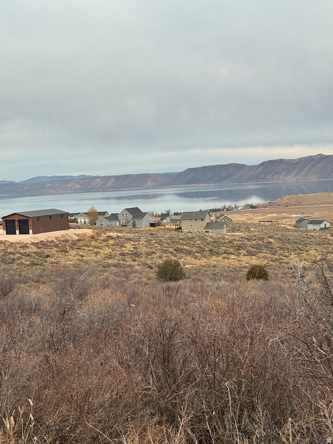 View of mountain background with a nearby body of water