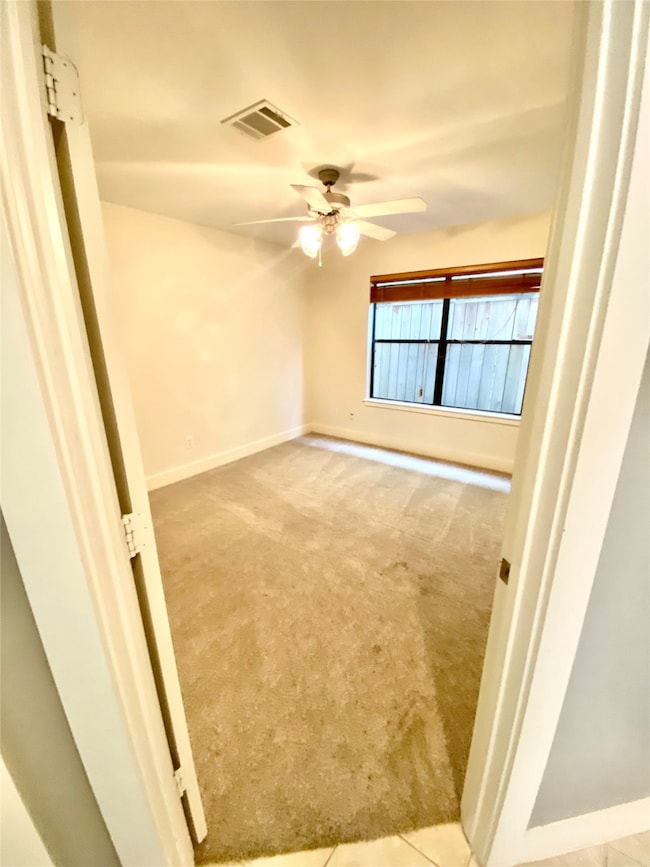 1st floor bedroom, including en-suite bathroom and good size closet.  Blinds and ceiling fan stay.