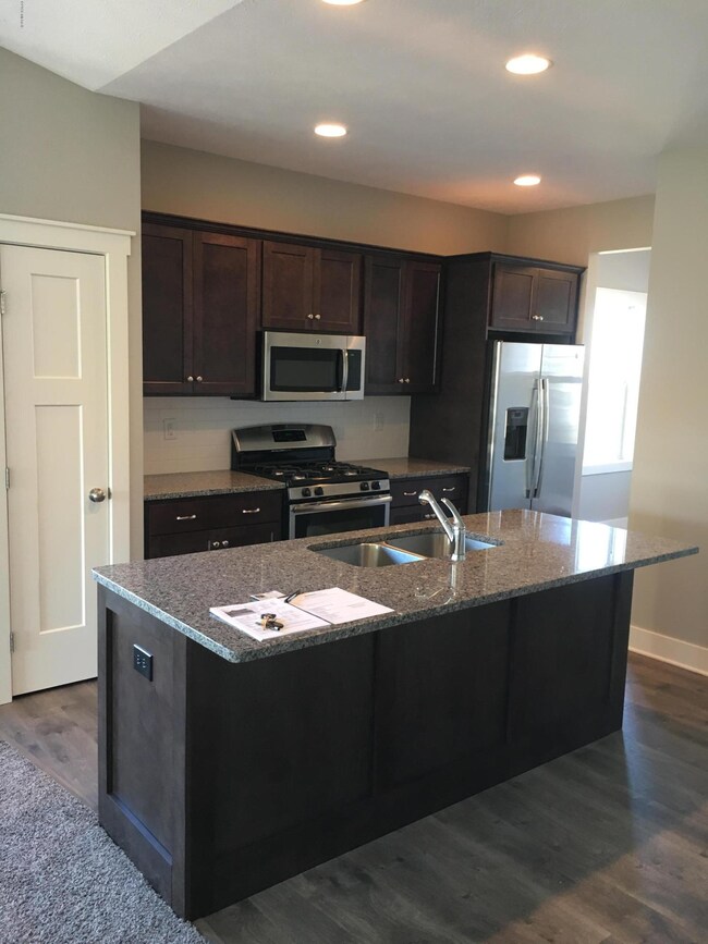 Kitchen with granite countertops