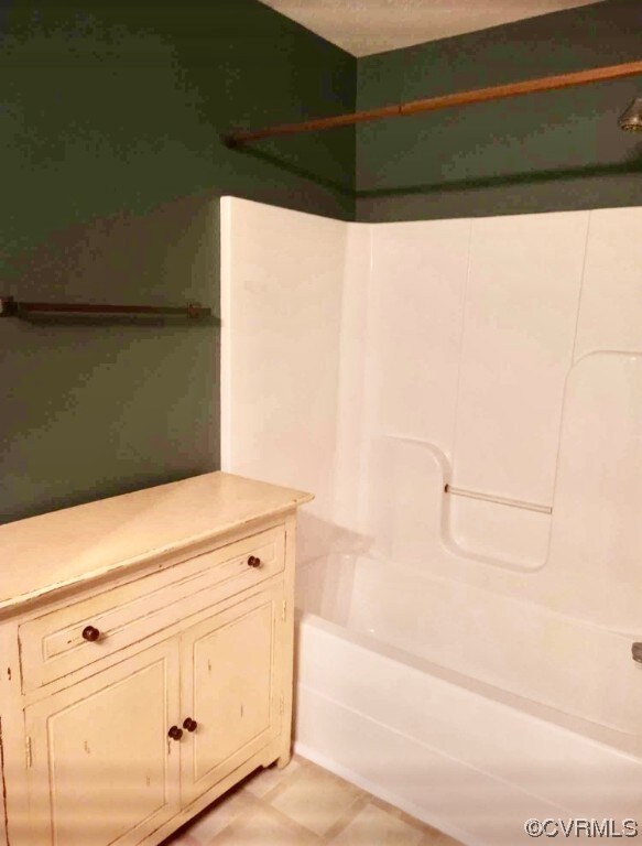 Bathroom with shower / bathing tub combination, va