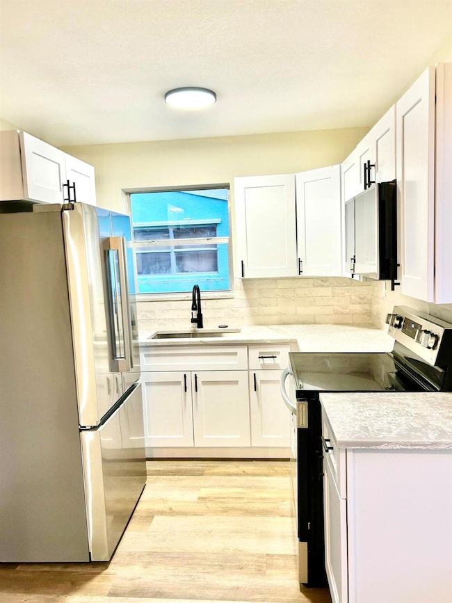 1210 W 26th Ct, Riviera Beach, FL 33404 - photo 7