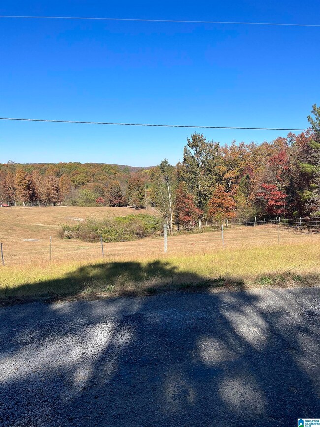 across the road from the listed property.