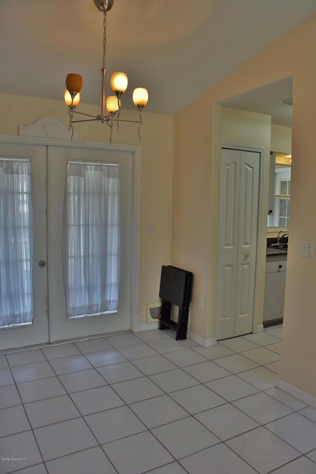 Formal Dining Room With French Doors To