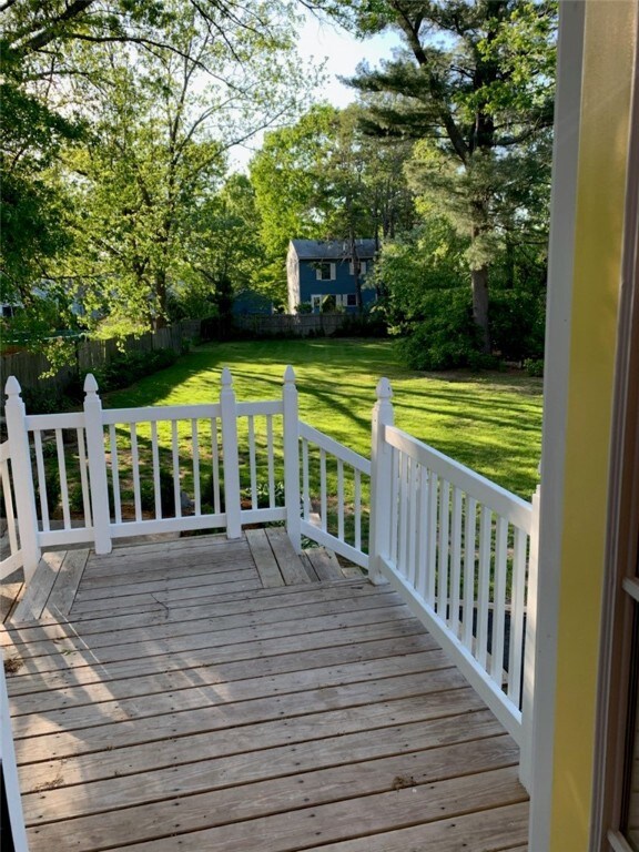 Deck overlooking large back yard