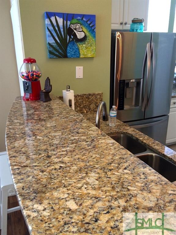 High end granite and new stainless two door refrig