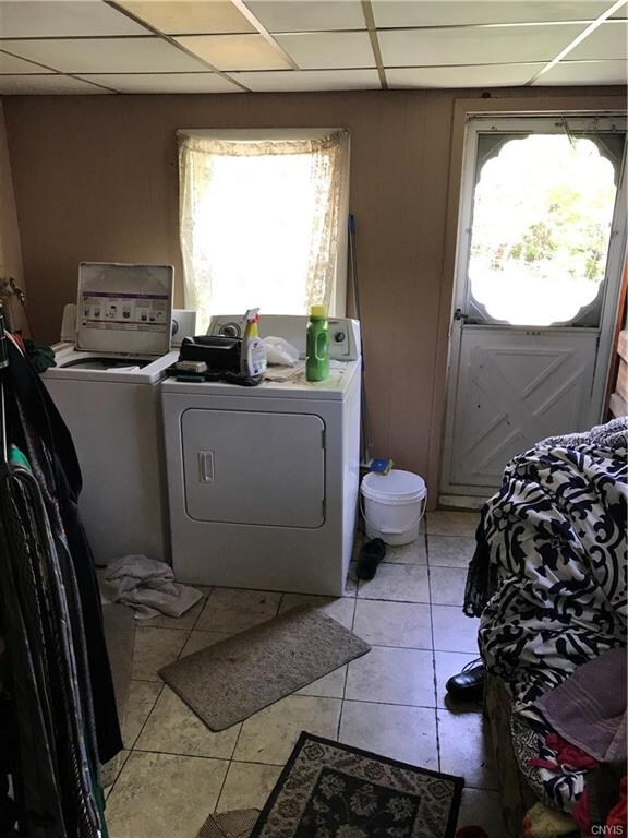 First floor laundry leading out to the back yard w