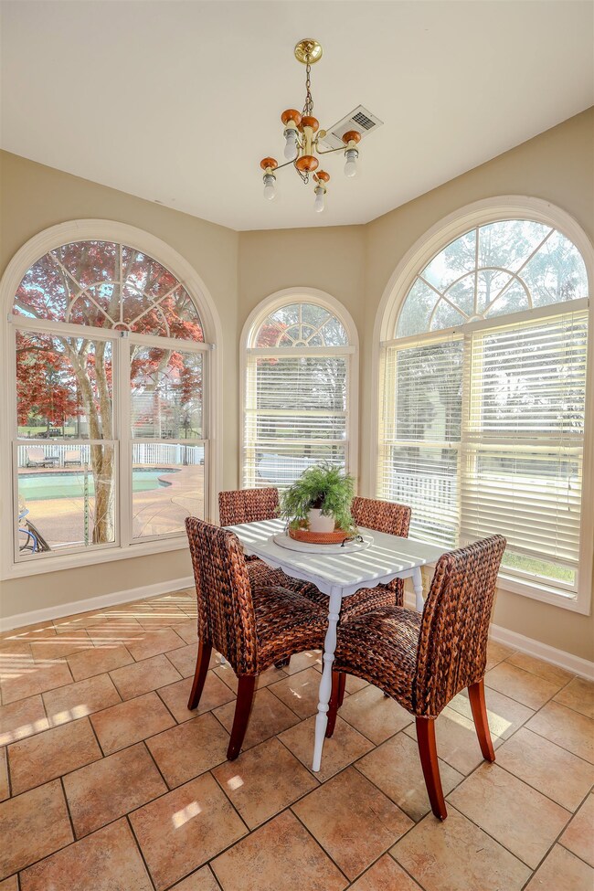 Dining area featuring plenty of natural light, bas