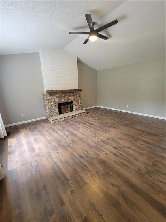 Unfurnished living room featuring baseboards, ceil