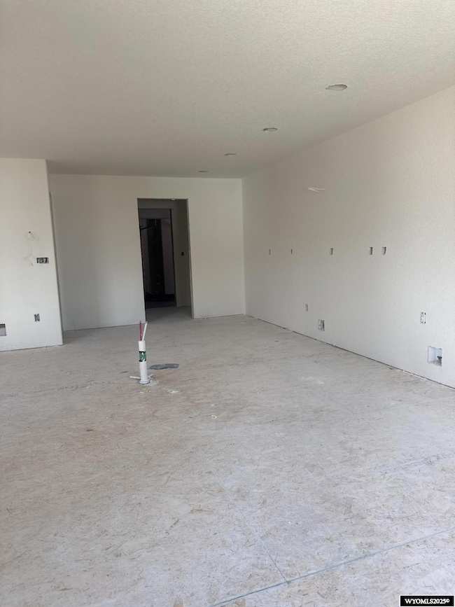 Looking through the dining room & kitchen to the mudroom.