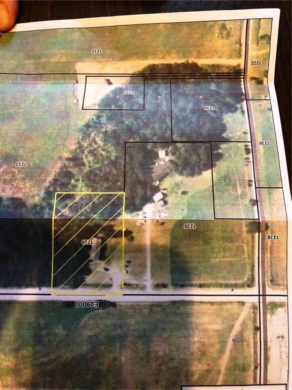 2 Acres is directly off of Mayberry Rd. with a woo