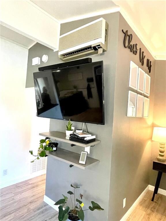 Natural gas forced air heat / (2) wall mounted AC