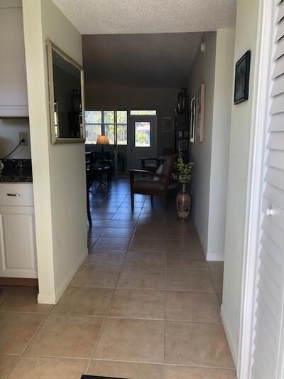 All tile floors. No carpet. Foyer entrance