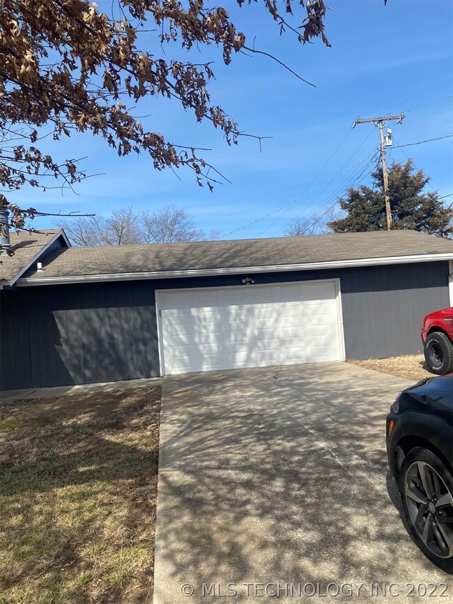 This over-sized 2 car garage has plenty space for