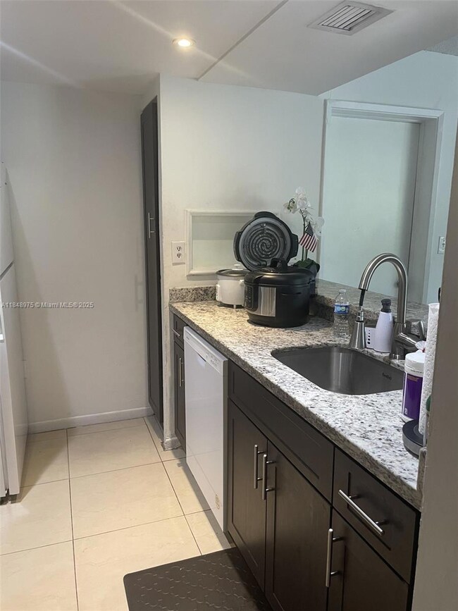 Las Brisas at Country Club of Miami unit C409, Hialeah, FL 33015 - photo 2