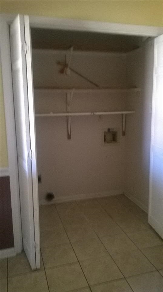 Laundry is located in eat in area of kitchen.