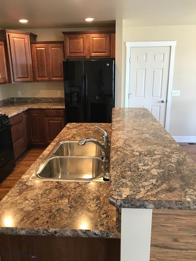 Kitchen. Photo of similar home.