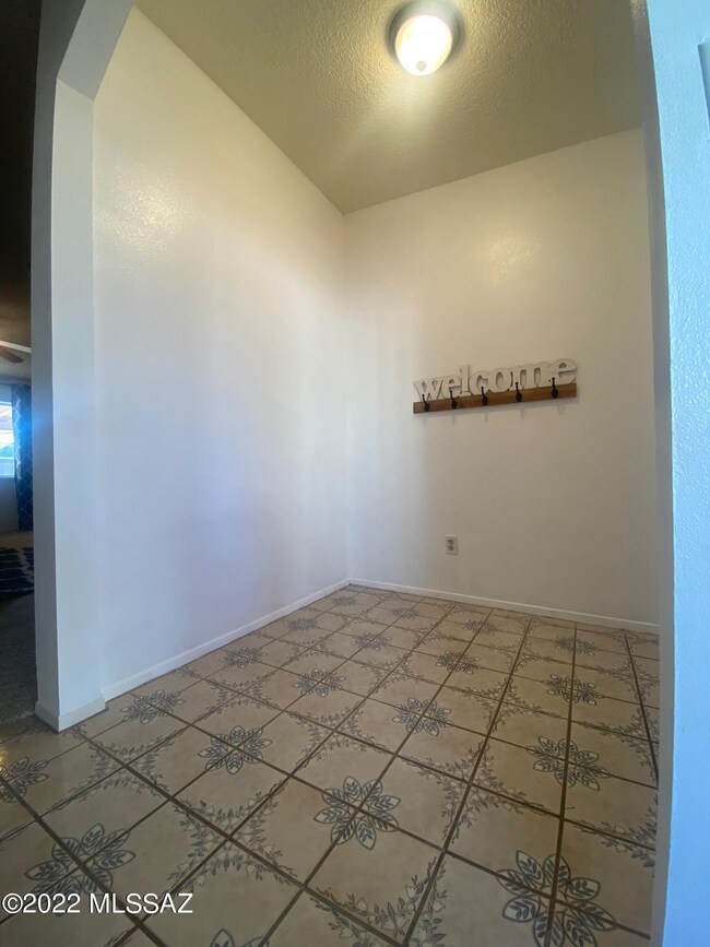 Entry and hall to bonus room