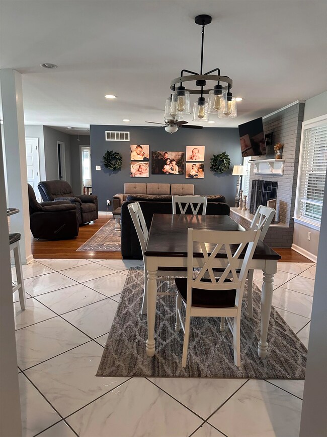 Dining area with visible vents, plenty of natural 