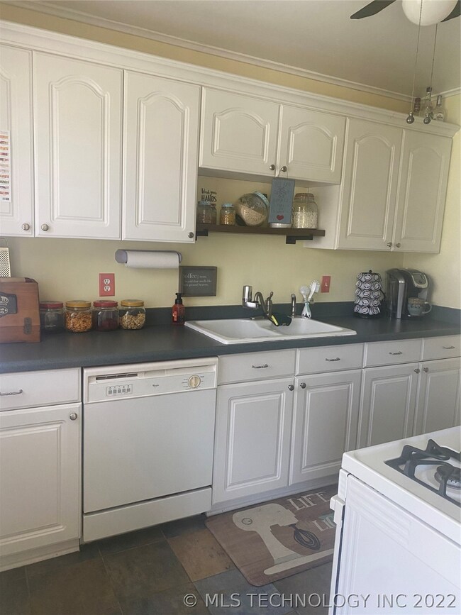 LOTS OF STORAGE IN THIS UPDATED KITCHEN