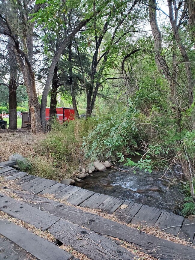 Bridge over the creek to half acre lot