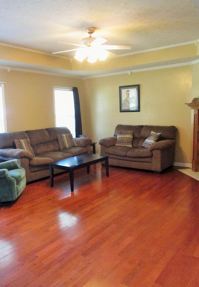 Living room opens to the dining/kitchen area.