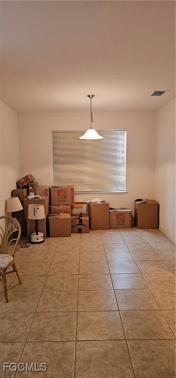 Dining space featuring tile patterned flooring