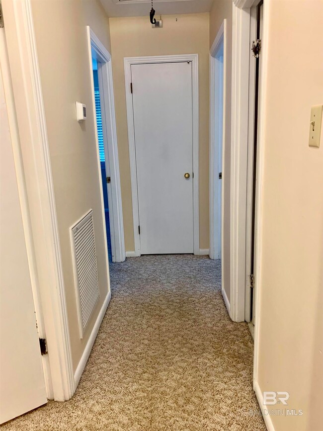 Hall with light carpet