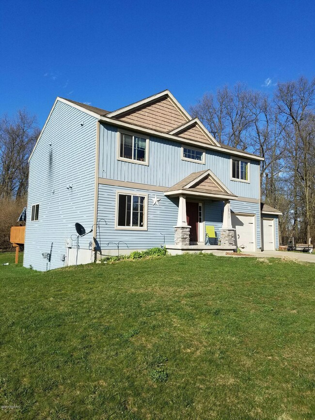 12777 Triple Oak Dr NE, Lowell, MI 49331 - photo 2