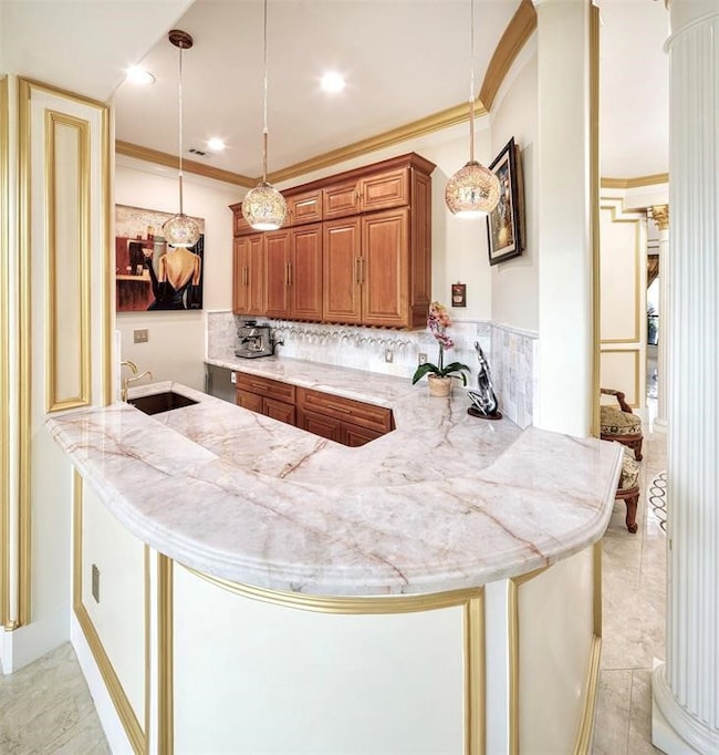 Beautiful onyx counter top in the wet bar.