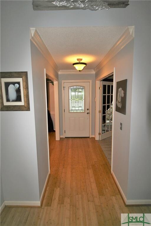Great foyer with formal living and dining on each 