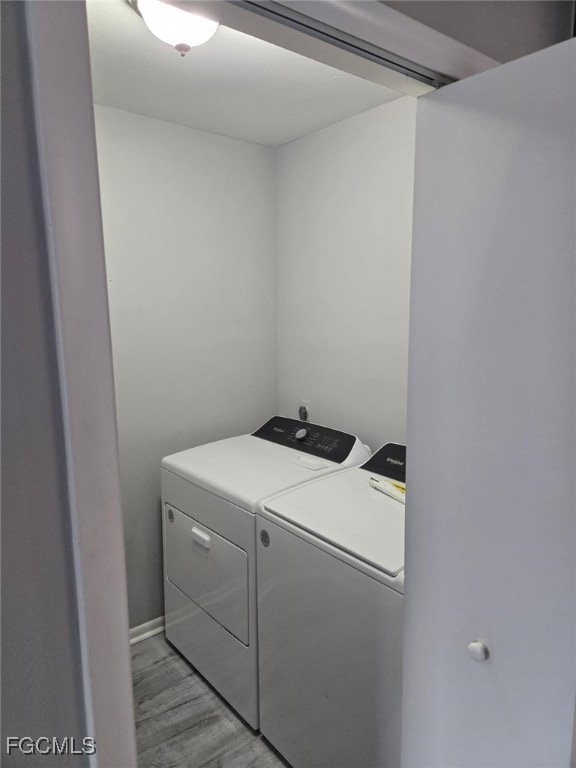 Laundry room with washing machine and clothes drye