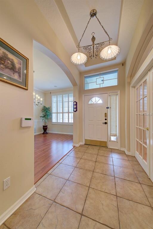 ELEGANT FOYER ENTRY WITH HIGH TRAY CEILING