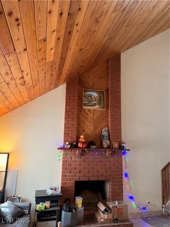 Living room featuring wood ceiling, lofted ceiling, and a brick fireplace