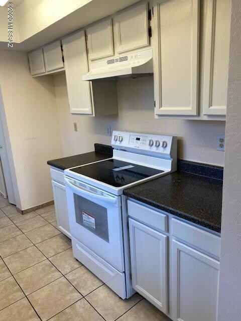 Kitchen has a brand new glass top stove