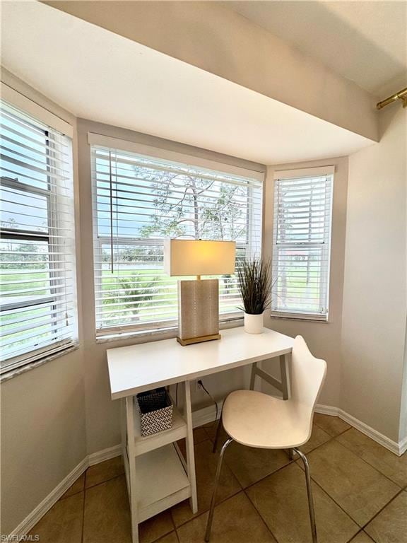 Space featuring tile patterned floors and plenty o