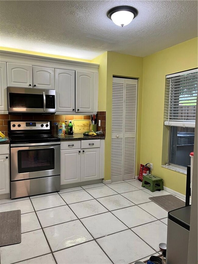 4734 Grapevine Way, Davie, FL 33331 - photo 2