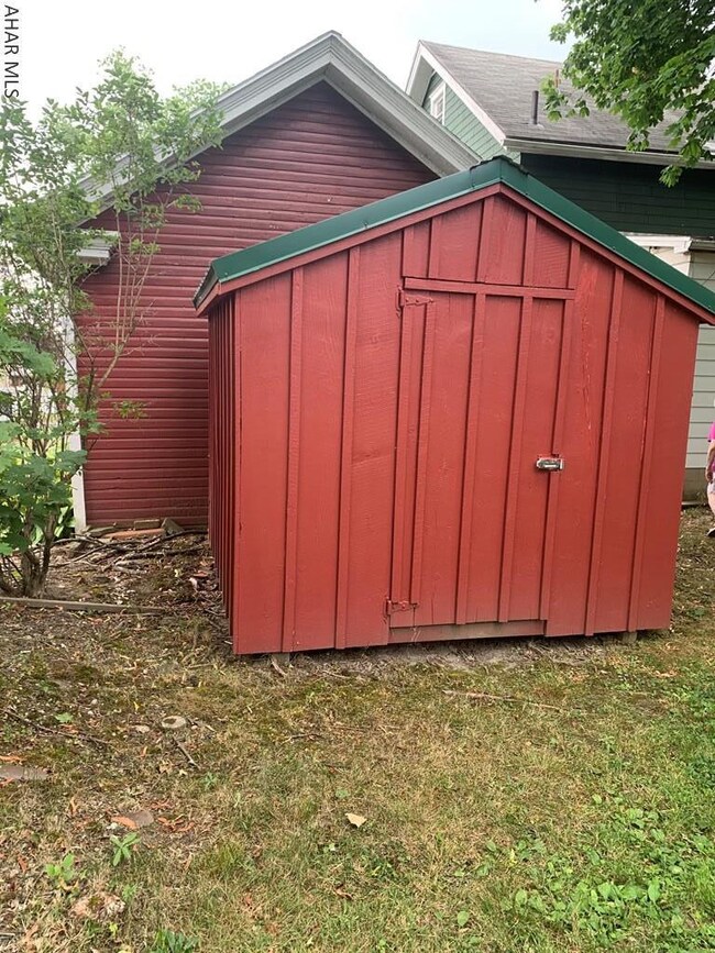 Shed behind garage