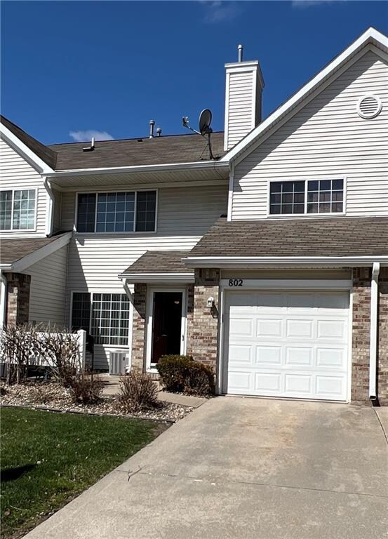 Front - Patio & 1 car garage