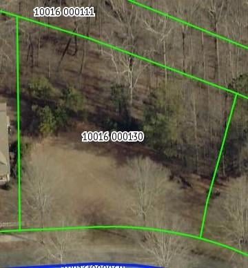 Aerial map of property and surrounding area with property parcel outlined