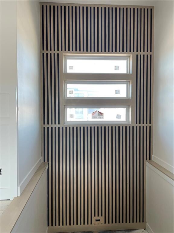 Feature wall over switchback staircare