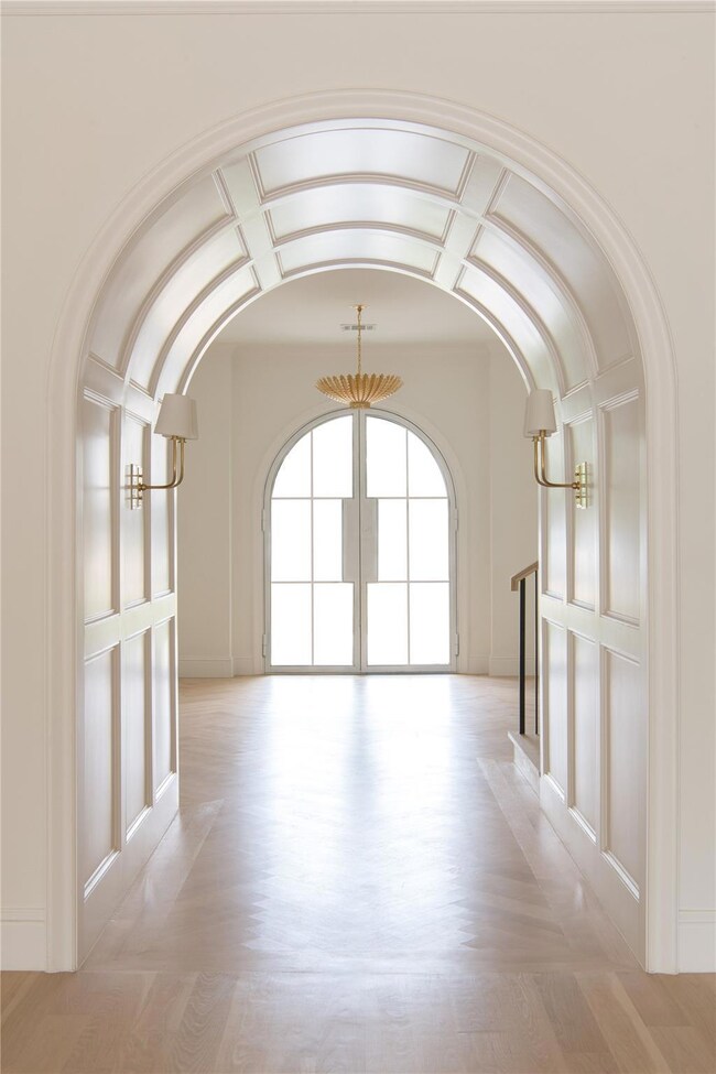 Unfurnished room with wood-type flooring and frenc