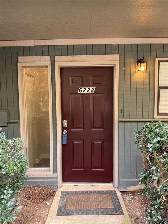 Property entrance featuring a porch