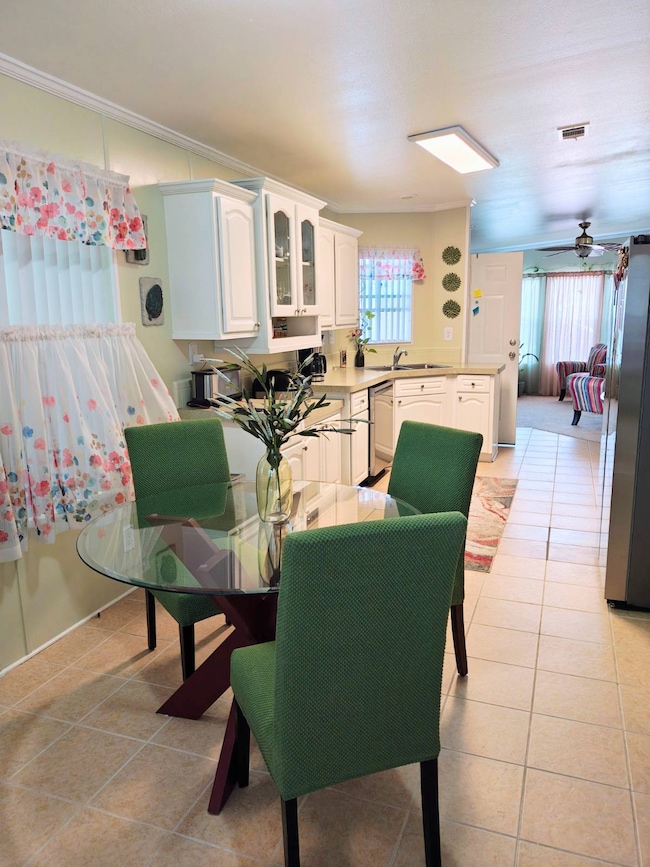 Breakfast Area into Kitchen/Living Rm