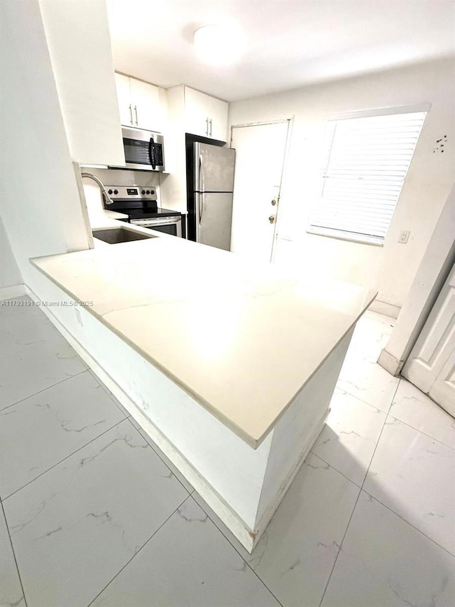 1401 NE 191st St unit D201, Miami, FL 33179 - photo 7